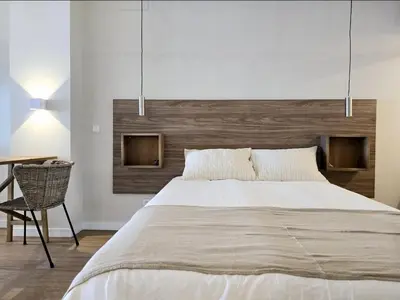 Cama o camas de una habitación en Lhome Macarena Centro Histórico
