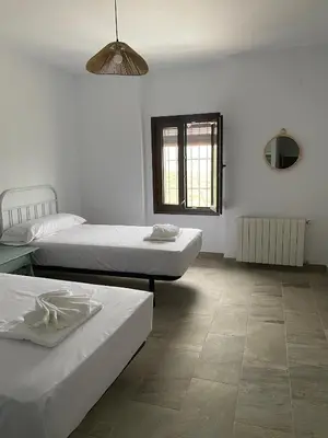 Cama o camas de una habitación en Cortijo Tacones