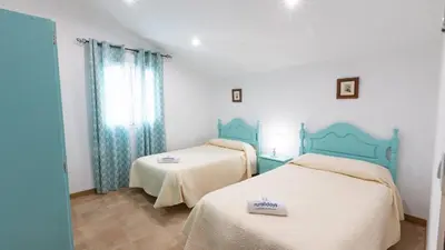 Cama o camas de una habitación en Casilla Soleá Carcabuey by Ruralidays