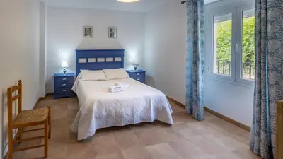 Cama o camas de una habitación en Casilla Soleá Carcabuey by Ruralidays