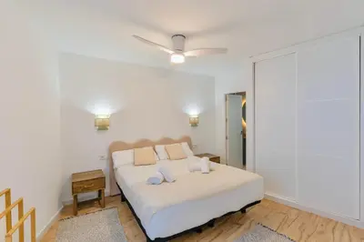Cama o camas de una habitación en Deanes Califa Suites