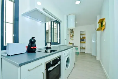 Una cocina o zona de cocina en Morgado Suites
