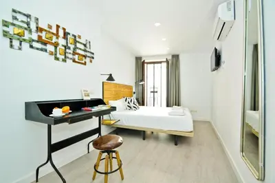 Cama o camas de una habitación en Morgado Suites