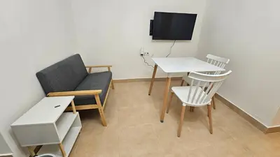 Una televisión o centro de entretenimiento en Apartamento para 2 personas en Jaén