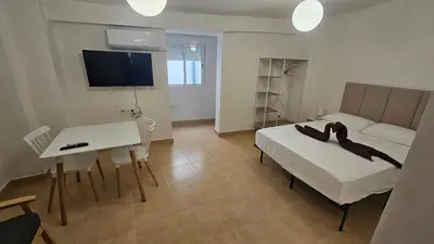 Una televisión o centro de entretenimiento en Apartamento para pareja en Jaén