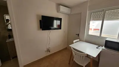 Una televisión o centro de entretenimiento en Estudio para pareja en Jaen