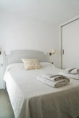Cama o camas de una habitación en Piso-loft AOVE pleno centro