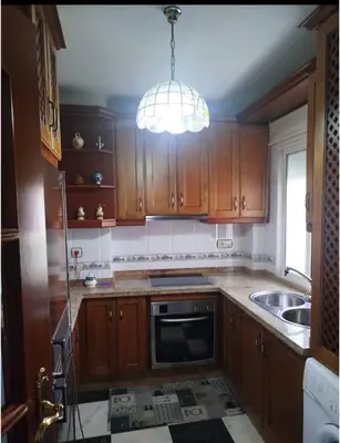 Una cocina o zona de cocina en Apartamento al pie de la torre