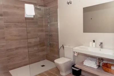 Un baño de Oliva Suite Apartamentos