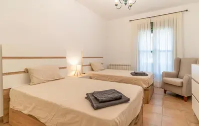 Cama o camas de una habitación en Gorgeous Home In Atarfe