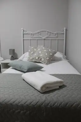 Cama o camas de una habitación en Casa Rural de Piedra