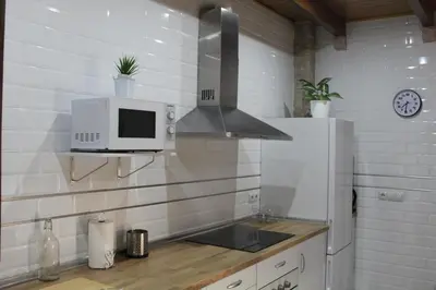 Una cocina o zona de cocina en Casa Rural de Piedra