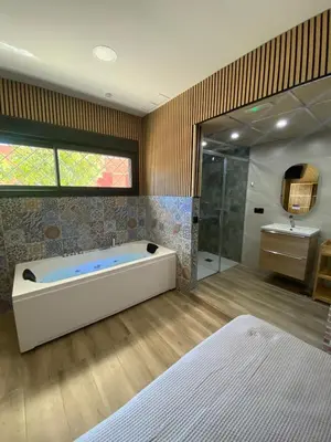 Cama o camas de una habitación en Apartamento en Sevilla DELUXURYROOM