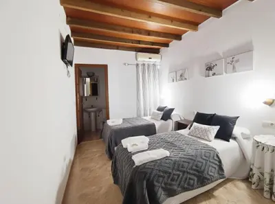 Cama o camas de una habitación en Alojamiento Acuario