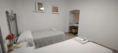 Cama o camas de una habitación en La Casa de Antonina