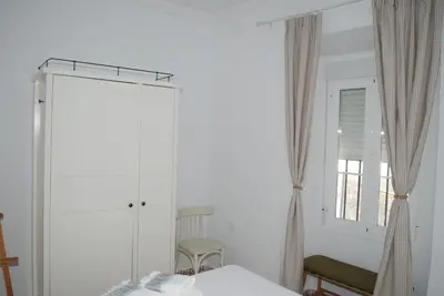Cama o camas de una habitación en La Casa de Antonina