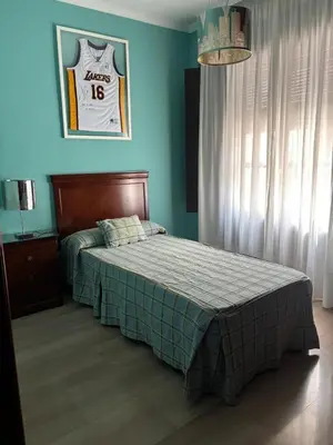 Cama o camas de una habitación en La Casa de Paquita