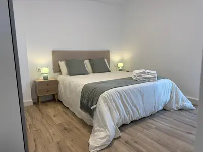 Cama o camas de una habitación en Entre Plazas Stay