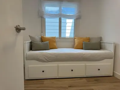 Cama o camas de una habitación en Entre Plazas Stay