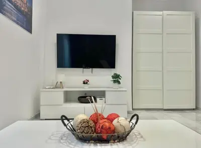 Una televisión o centro de entretenimiento en Alexein Plaza de las Tendillas