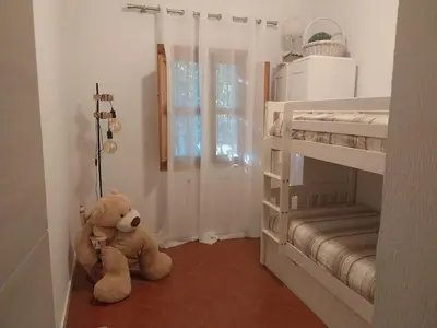 Cama o camas de una habitación en villa torreon