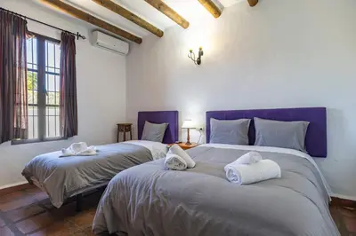 Cama o camas de una habitación en Villa rural con piscina en Alora