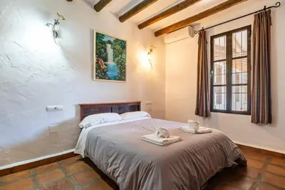 Cama o camas de una habitación en Villa rural con piscina en Alora