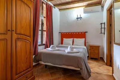Cama o camas de una habitación en Villa rural con piscina en Alora