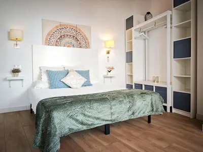Cama o camas de una habitación en La buhardilla del duende