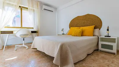 Cama o camas de una habitación en Apartamento acogedor y luminoso en Córdoba