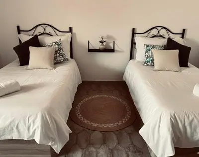 Cama o camas de una habitación en Apartamentos El Paso