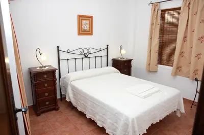 Cama o camas de una habitación en La Choza De Mamuyo