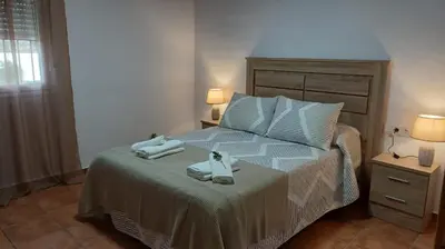 Cama o camas de una habitación en Casas rurales La Colada
