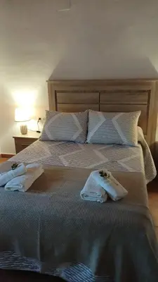 Cama o camas de una habitación en Casas rurales La Colada