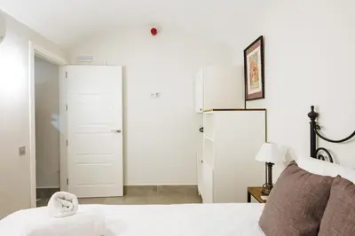 Cama o camas de una habitación en Apartamentos Trinidad