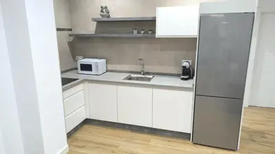 Una cocina o zona de cocina en Apartamento Santísima Trinidad
