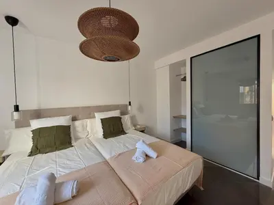 Cama o camas de una habitación en Cruz Conde Suite Deluxe