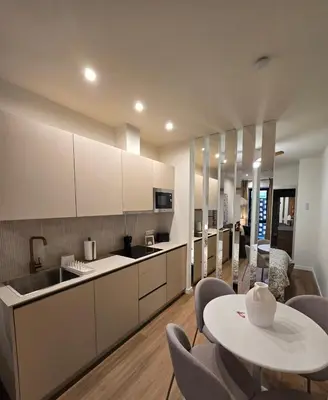 Una cocina o zona de cocina en LHOME Puerta Osario Centro Ciudad