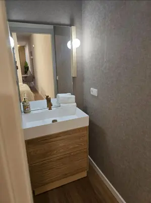 Un baño de LHOME Puerta Osario Centro Ciudad