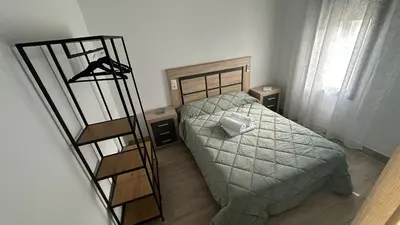 Cama o camas de una habitación en Casa Jardin Las Eras De Campotejar