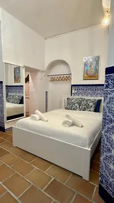 Cama o camas de una habitación en La Dolce Vita - Mercado de Feria