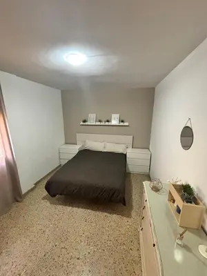Cama o camas de una habitación en Apartamento luminoso con patio privado junto a la Plaza de Toros de Montoro