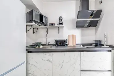 Una cocina o zona de cocina en El Patio del Agua - Luxury Center Apartment