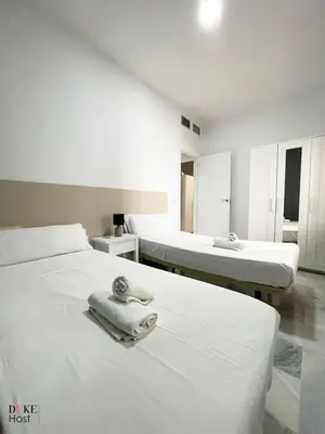 Cama o camas de una habitación en Macarena Apartment