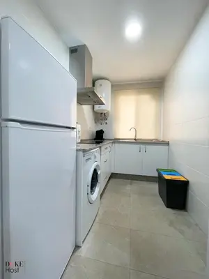 Una cocina o zona de cocina en Macarena Apartment
