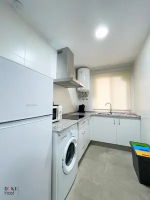 Una cocina o zona de cocina en Macarena Apartment