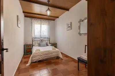 Cama o camas de una habitación en Cortijo Sierra del Agua