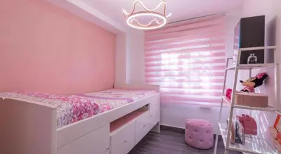 Cama o camas de una habitación en La Magia del Rosa