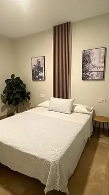 Cama o camas de una habitación en Loft II Madueño de los Aires parking incluido