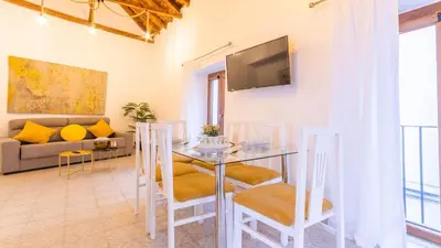 Una televisión o centro de entretenimiento en Apartamento Sancho Panza Centro Cordoba